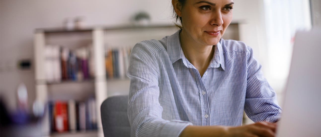 dark haired woman at pc