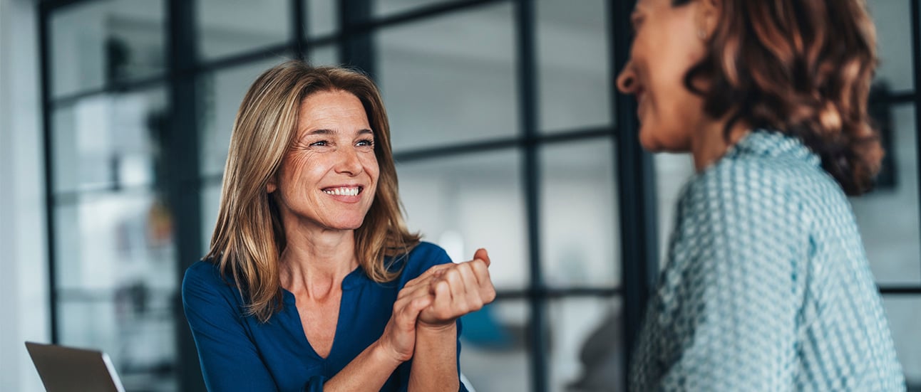 two women smiling
